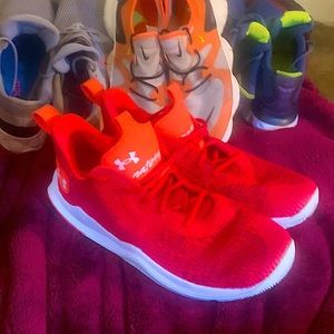 Under Armour. Size 12.5. Red and orange.